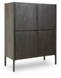 Ashley Furniture Orsonal Accent Cabinet with closed doors, wood finish, and modern design for stylish storage.
