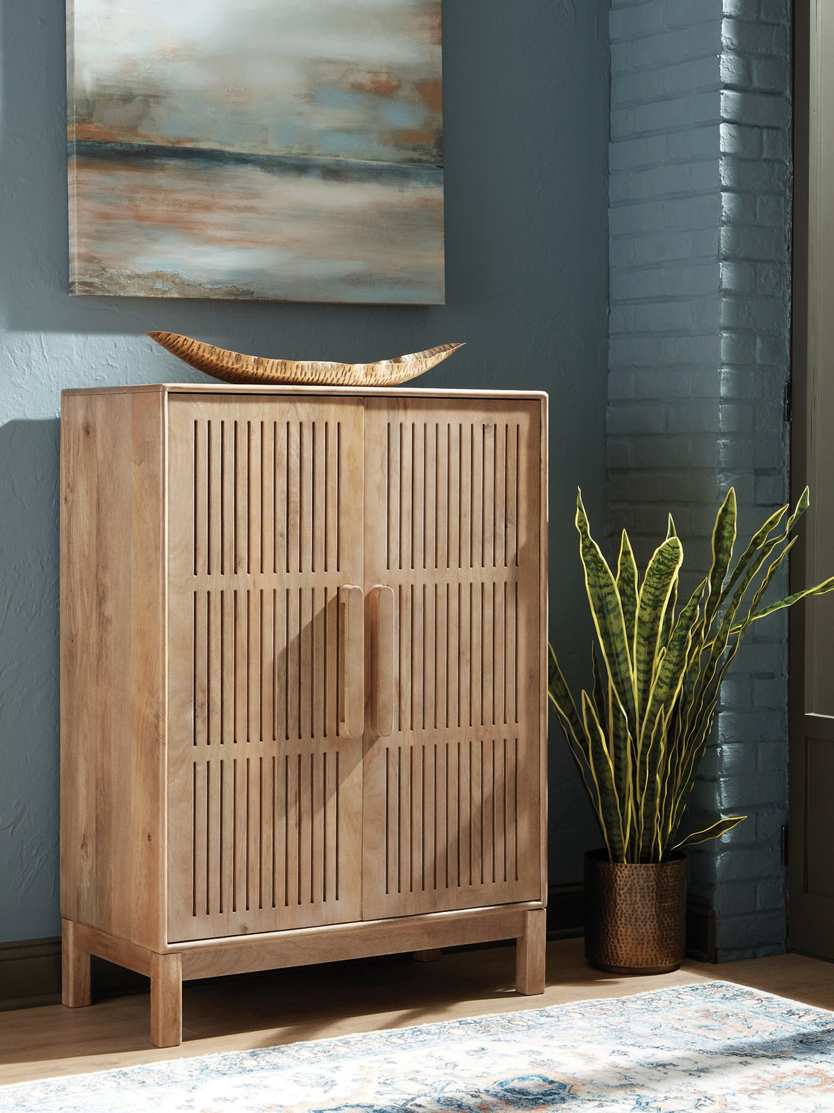 Ashley Furniture Pellamour accent bar cabinet with wood finish and sleek design, featuring doors and storage compartments.