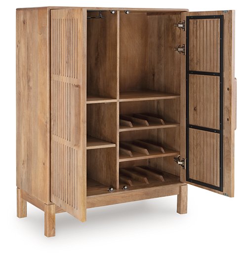 Ashley Furniture Pellamour accent bar cabinet with open doors showing shelves and storage space in a stylish design.