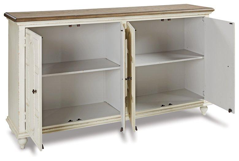 Ashley Furniture Roranville accent cabinet with wood finish, featuring storage drawers and a stylish design for living room decor.