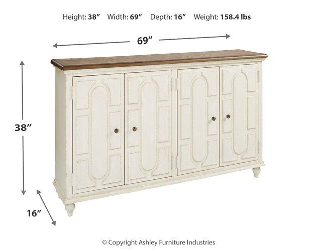 Ashley Furniture Roranville accent cabinet with wood finish, featuring storage drawers and decorative detailing.