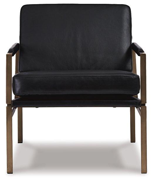 Ashley Furniture Puckman Accent Chair with plush fabric and modern design, featuring a comfortable, stylish seating option.