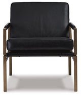 Ashley Furniture Puckman Accent Chair with plush fabric and modern design, featuring a comfortable, stylish seating option.