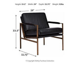 Ashley Furniture Puckman Accent Chair with plush fabric and modern design, perfect for stylish living room seating.