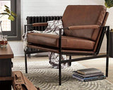 Ashley Furniture Puckman Accent Chair with modern design and plush upholstery, perfect for living room or bedroom decor.