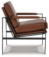 Ashley Furniture Puckman Accent Chair with plush fabric and modern design, showcasing a stylish, comfortable seating option.