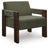 Ashley Furniture Adlanlock accent chair with plush fabric and wooden legs, shown from a side angle with modern design details.