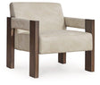 Ashley Furniture Adlanlock accent chair with plush upholstery and wooden legs, stylishly designed for living room decor.