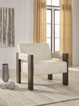 Ashley Furniture Adlanlock accent chair with plush fabric and stylish design, showcasing its comfortable seating and modern look.