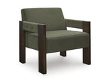Ashley Furniture Adlanlock accent chair with plush fabric and modern design, shown in a cozy living room setting.