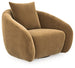Ashley Furniture Yahya swivel accent chair with plush fabric and modern design, shown from an angled side view.