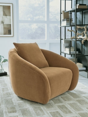 Ashley Furniture Yahya swivel accent chair with plush fabric and modern design, shown in a cozy living room setting.