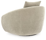 Ashley Furniture Yahya swivel accent chair with plush fabric and modern design, shown from the back view.
