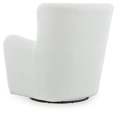 Ashley Furniture Rowenburg Swivel Glider Accent Chair with plush fabric and wooden base, shown from the back in a cozy living space.