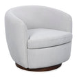 Ashley Furniture Annbury swivel accent chair with plush fabric and wooden legs, shown from an angled view.