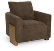 Ashley Furniture Dairlett Accent Chair with plush upholstery and wooden legs, shown from an angled view.