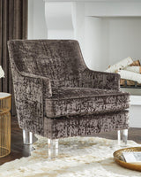Ashley Furniture Gloriann Accent Chair with plush fabric and modern design, showcasing a stylish and comfortable seating option.