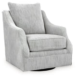 Ashley Furniture Gubbins swivel accent chair with a plush upholstered seat and modern design, shown from an angled side view.