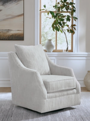 Ashley Furniture Gubbins swivel accent chair with plush fabric and modern design, shown in a cozy living room setting.