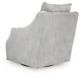 Ashley Furniture Gubbins swivel accent chair with plush upholstery and a modern design, shown from the back view.