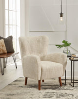 Ashley Furniture Jemison Next-Gen Nuvella accent chair with plush fabric and modern design, perfect for living room or lounge space.