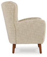 Ashley Furniture Jemison Next-Gen Nuvella Accent Chair with plush fabric and modern design, shown in a cozy living room setting.