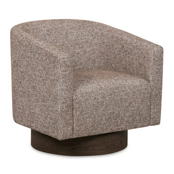 Ashley Furniture Jorryn swivel accent chair with plush upholstery and modern design, shown from an angled view.