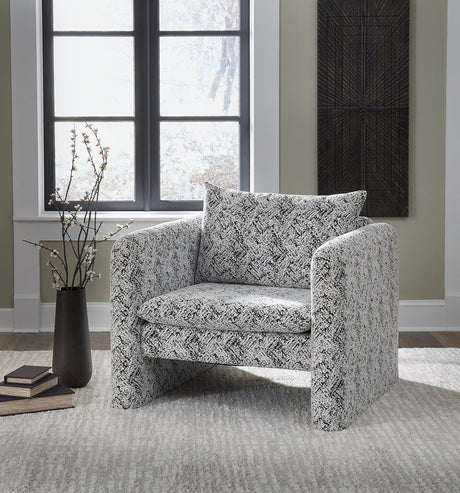 Ashley Furniture Kenbell accent chair with beige upholstery and wooden legs, showcasing a stylish, modern design.