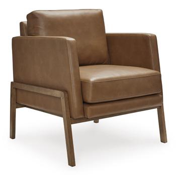 Ashley Furniture Numund accent chair with plush fabric upholstery and modern design, shown in a stylish living room setting