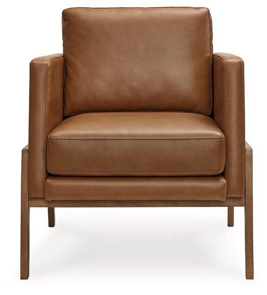 Ashley Furniture Numund accent chair with plush fabric and modern design, perfect for living room or bedroom decor.