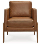 Ashley Furniture Numund accent chair with plush fabric and modern design, perfect for living room or bedroom decor.
