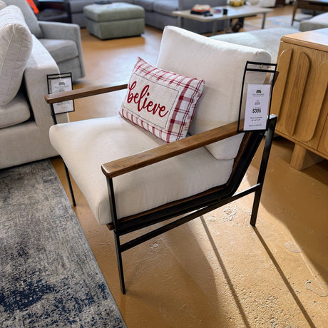 Ashley Furniture Tilden Accent Chair with plush upholstery and wooden legs, designed for stylish living room seating.