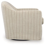Ashley Furniture Valwick swivel accent chair with plush fabric and modern design, shown from a side angle.
