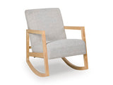 Ashley Furniture Wychworth accent chair with plush upholstery and wooden legs, shown from a stylish side angle.