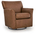 Ashley Furniture Braydunn swivel glider accent chair with plush upholstery and modern design, shown from an angled side view.