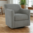Harlow swivel accent chair by Ashley Furniture with a stylish fabric upholstery and a rounded backrest for modern living rooms.