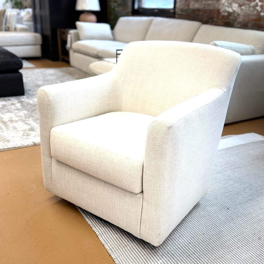 Ashley Furniture Harlow swivel accent chair with plush upholstery and modern design, shown from a front angle.