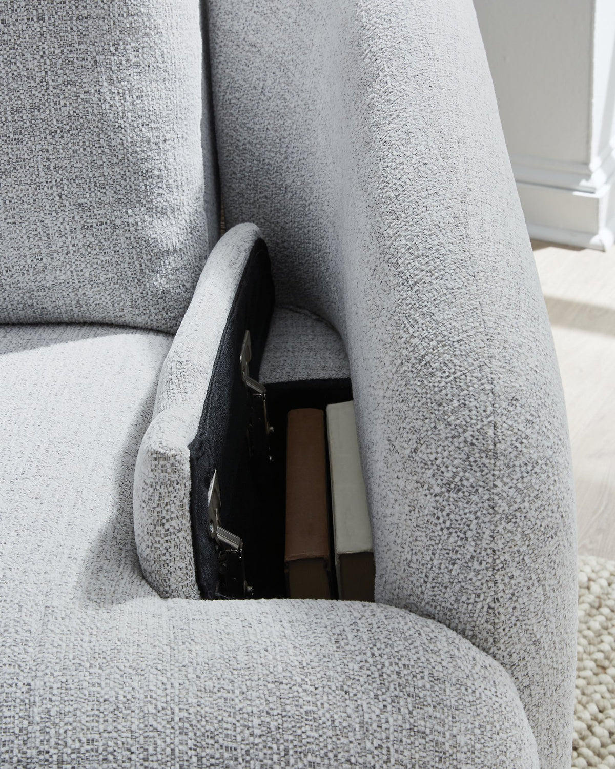 Ashley Furniture Alainmont Next-Gen Nuvella swivel power recliner accent chair with plush upholstery and modern design.