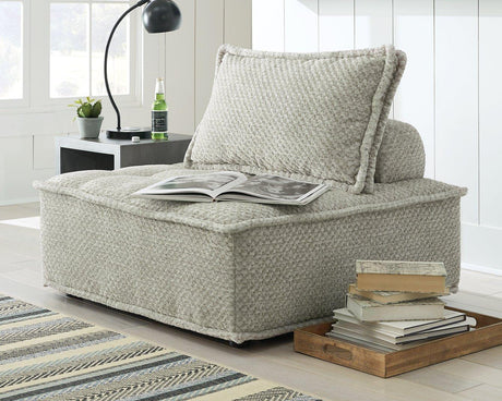 Ashley Furniture Bales accent chair with plush fabric and modern design, featuring a comfortable backrest and stylish wooden legs.