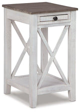 Ashley Furniture Adalane Accent Table with wooden finish, featuring a sleek round tabletop and modern design for living room decor.