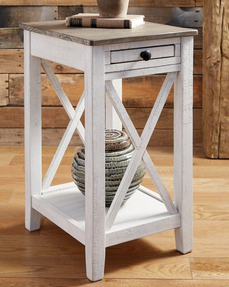 Ashley Furniture Adalane accent table with a sleek wooden top and metal legs, ideal for living room or bedroom decor.