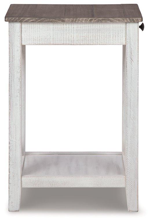 Ashley Furniture Adalane accent table with a sleek wooden top and metal legs, perfect for living room decor.