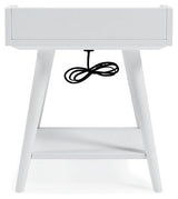 Ashley Furniture Blariden accent table with a wooden top and metal legs, stylish and functional for living room decor.