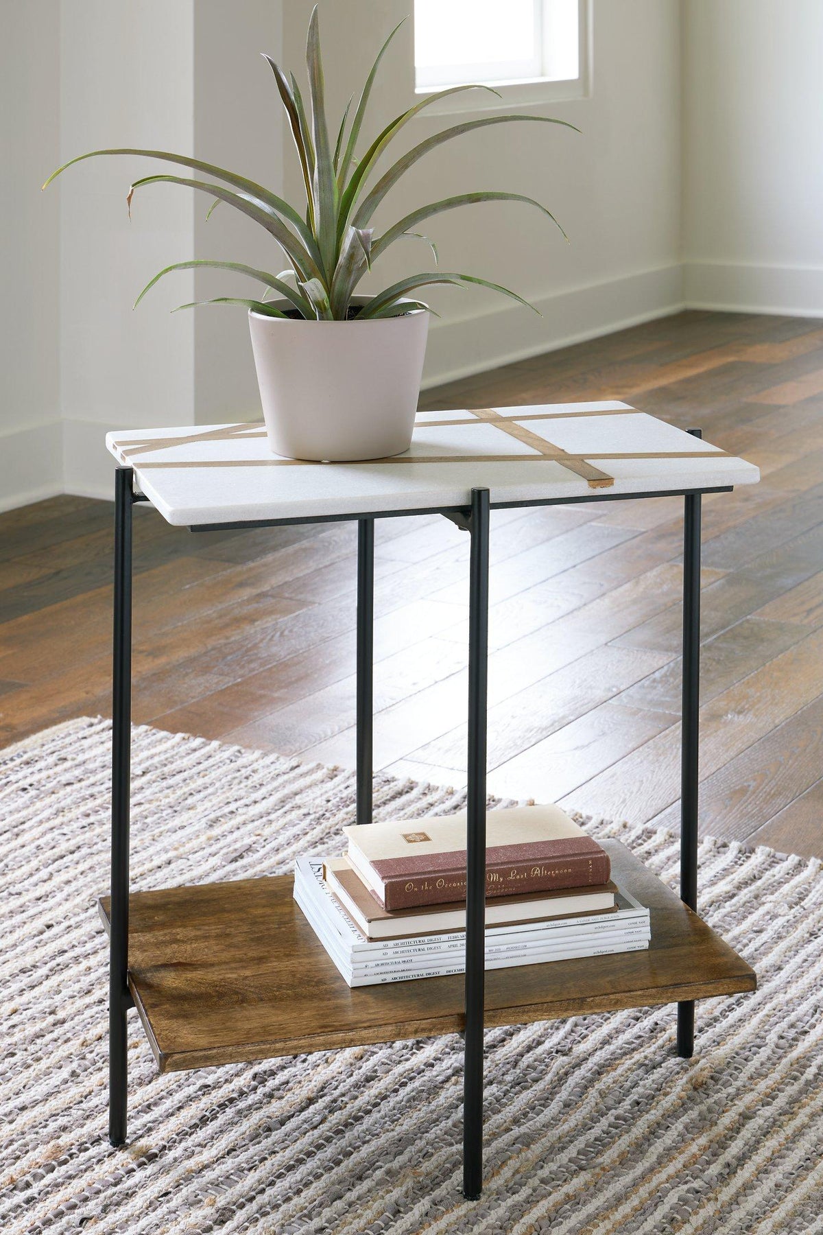 Ashley Furniture Braxmore Accent Table with wooden top and metal legs, showcasing a modern design suitable for living rooms.