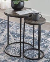 Set of two Ashley Furniture Briarsboro accent tables with wooden tops and tapered legs, ideal for stylish living room decor.