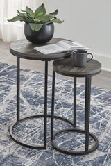 Set of two Ashley Furniture Briarsboro accent tables with wooden tops and black metal legs, ideal for living room decor.