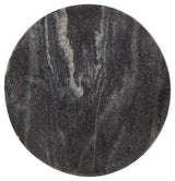 Ashley Furniture Caramont Accent Table with a round wooden top and tapered legs, perfect for living room decor.