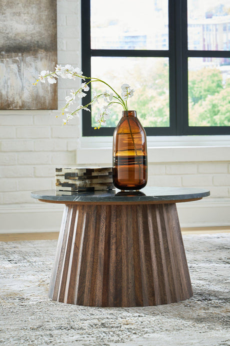 Ashley Furniture Ceilby accent coffee table with a modern design and wooden finish, perfect for living room decor.