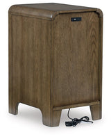 Ashley Furniture Jensworth accent table with dark wood finish and sleek design, shown from the back in a modern living room setting.
