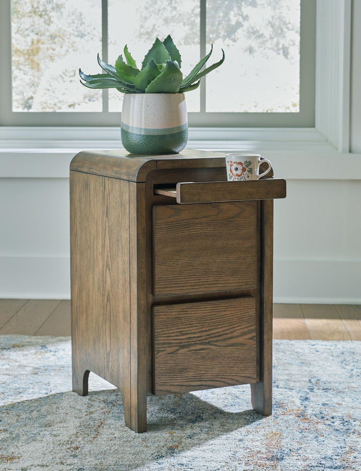 Ashley Furniture Jensworth accent table with wooden top and metal legs, ideal for living room or bedroom decor.